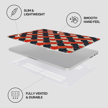 Laptop with a geometric patterned skin on a light gray background, featuring text labels about the product's features.