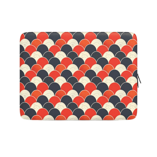 Laptop sleeve with a pattern of red, blue, and beige circles on a white background