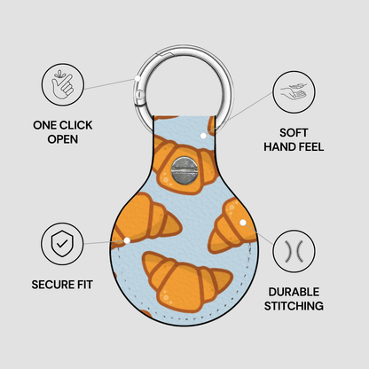 Keychain with croissant pattern and features listed on a gray background | Casenari