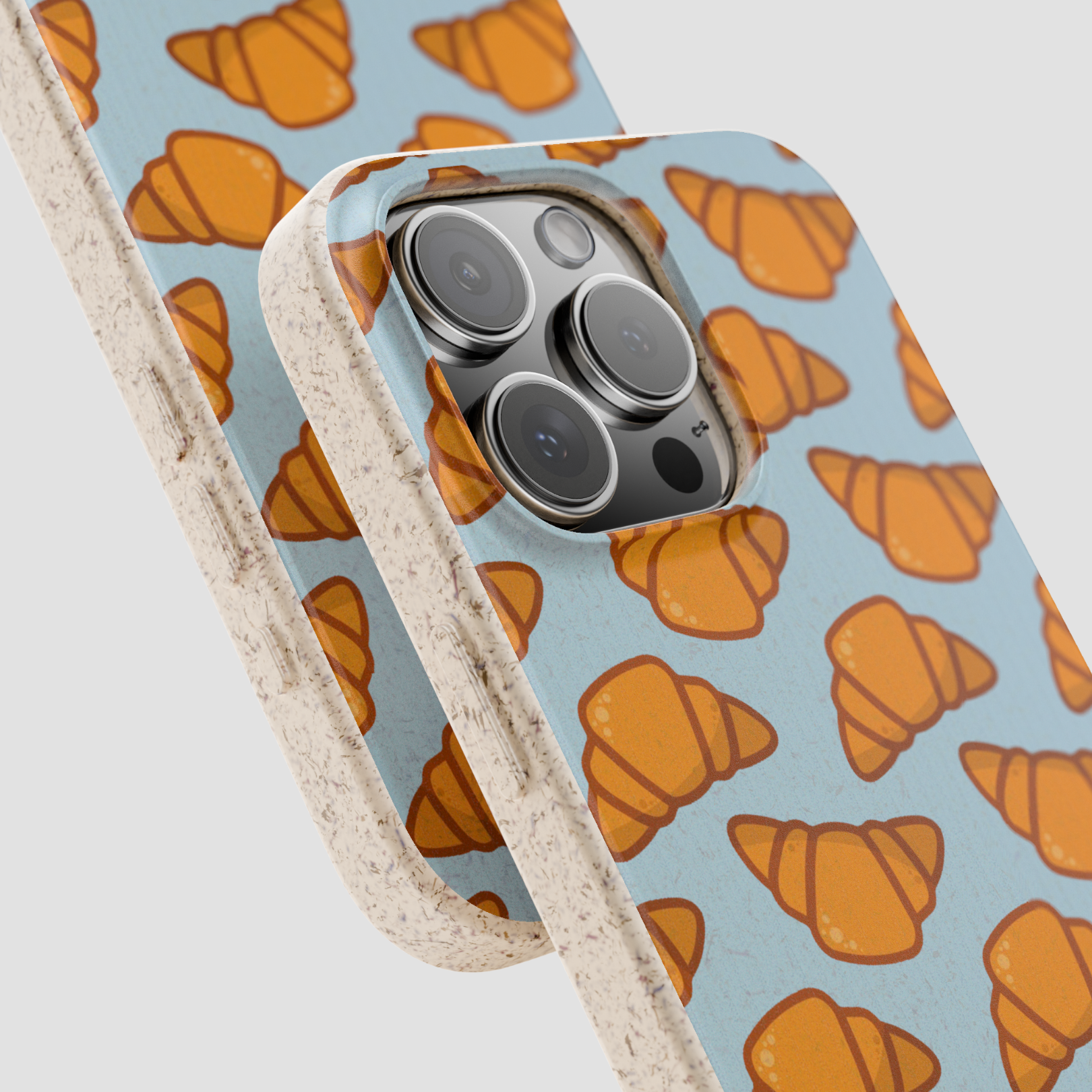 Phone case with croissant pattern on a light blue background | Casenari