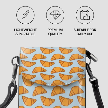 Crossbody bag with croissant pattern and features listed on a light gray background | Casenari
