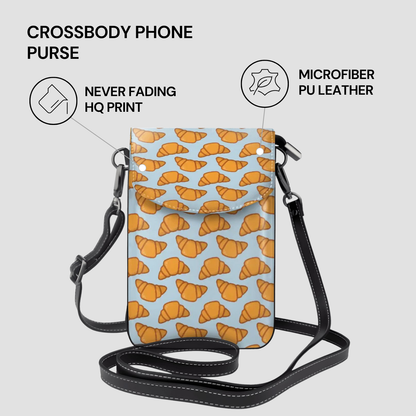 Crossbody phone purse with croissant pattern on a light blue background | Casenari