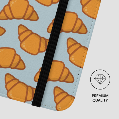 Notebook with croissant pattern and 'Premium Quality' label | Casenari