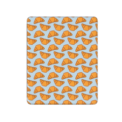 Patterned product with orange croissant design on a blue background | Casenari
