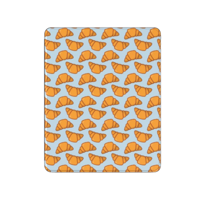 Patterned product with orange croissant design on a blue background | Casenari