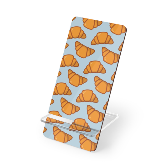 Phone stand with croissant pattern on a light blue background | Casenari