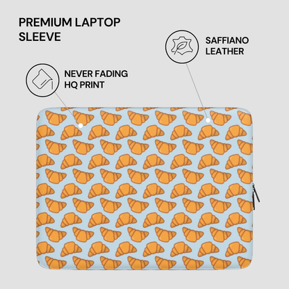 Laptop sleeve with croissant pattern on a light blue background | Casenari