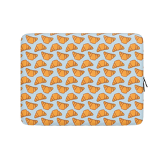 Laptop sleeve with croissant pattern on a light blue background | Casenari