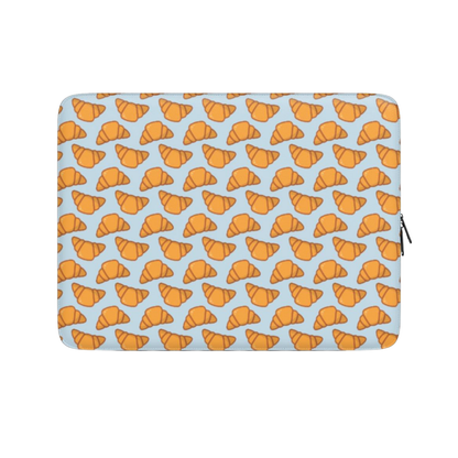Laptop sleeve with croissant pattern on a light blue background | Casenari
