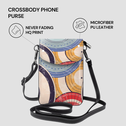 Crossbody phone purse with abstract design on a light gray background