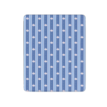 A square tablet skin or case cover featuring a blue and white vertical stripe pattern with small white floral motifs, shown on a plain white background.