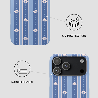 Blue striped phone case with white floral motifs, shown with feature callouts: UV protection icon and raised bezels icon on a light gray background.