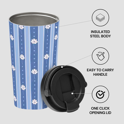 A blue and white patterned insulated stainless steel travel tumbler with a black flip-top lid, shown on a light gray background with feature callouts reading insulated steel body, easy to carry handle, and one click opening lid.