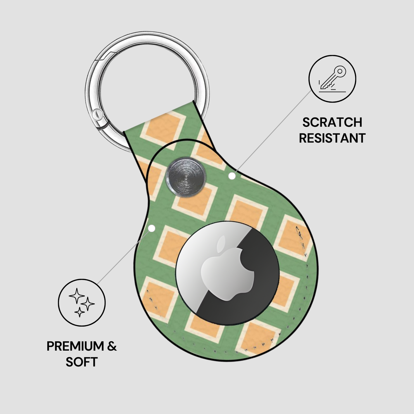 Green keychain with Apple logo on a light gray background