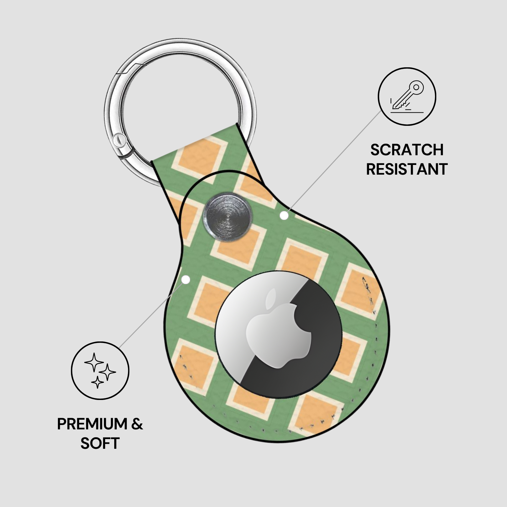 Green keychain with Apple logo on a light gray background