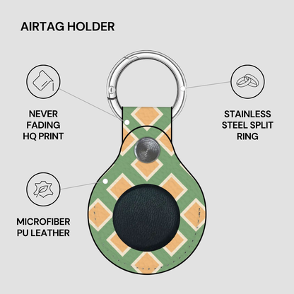Airtag holder with green and orange diamond pattern on a gray background
