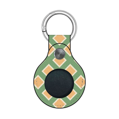 Keychain with green and orange pattern on a white background