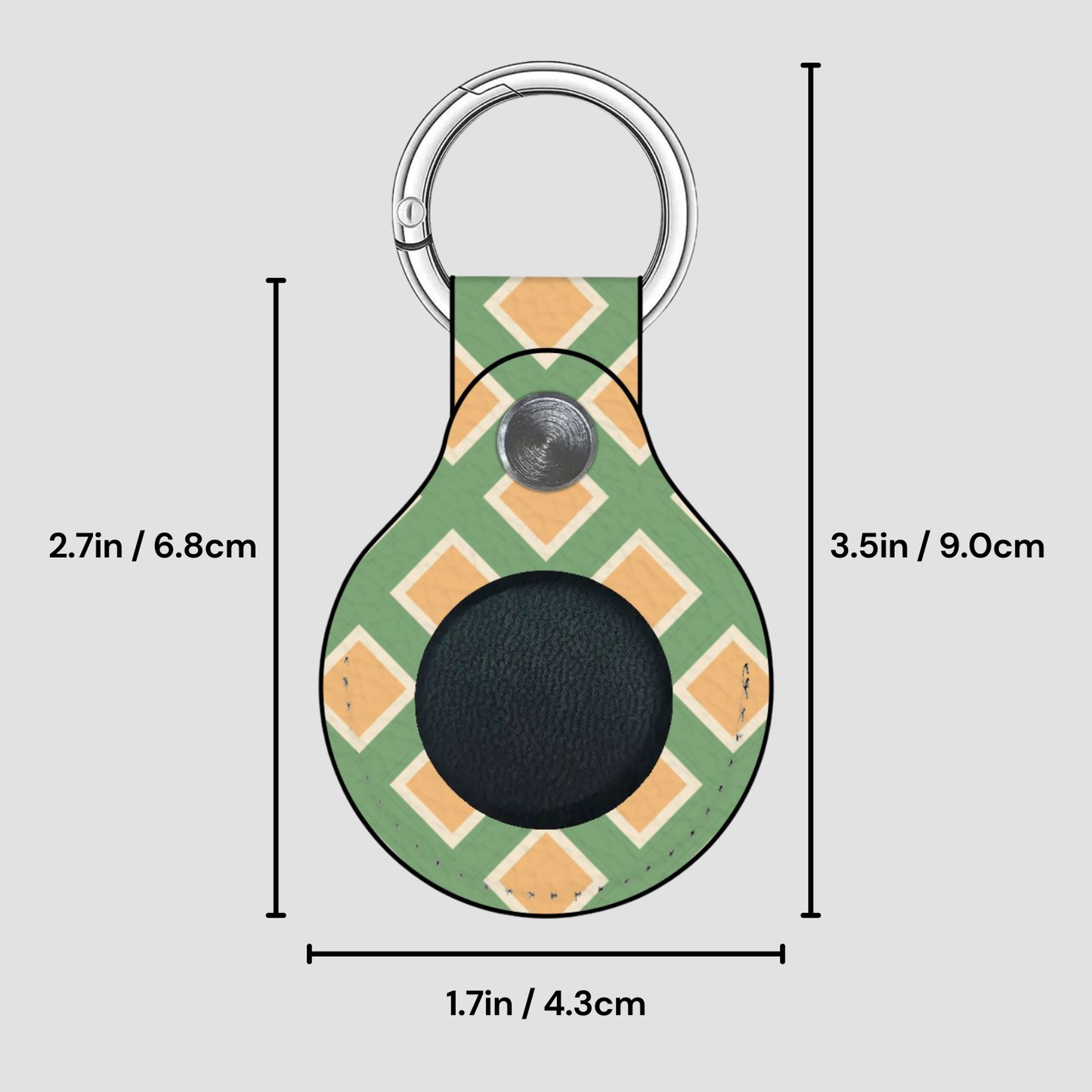 Keychain with geometric pattern and measurements on a gray background