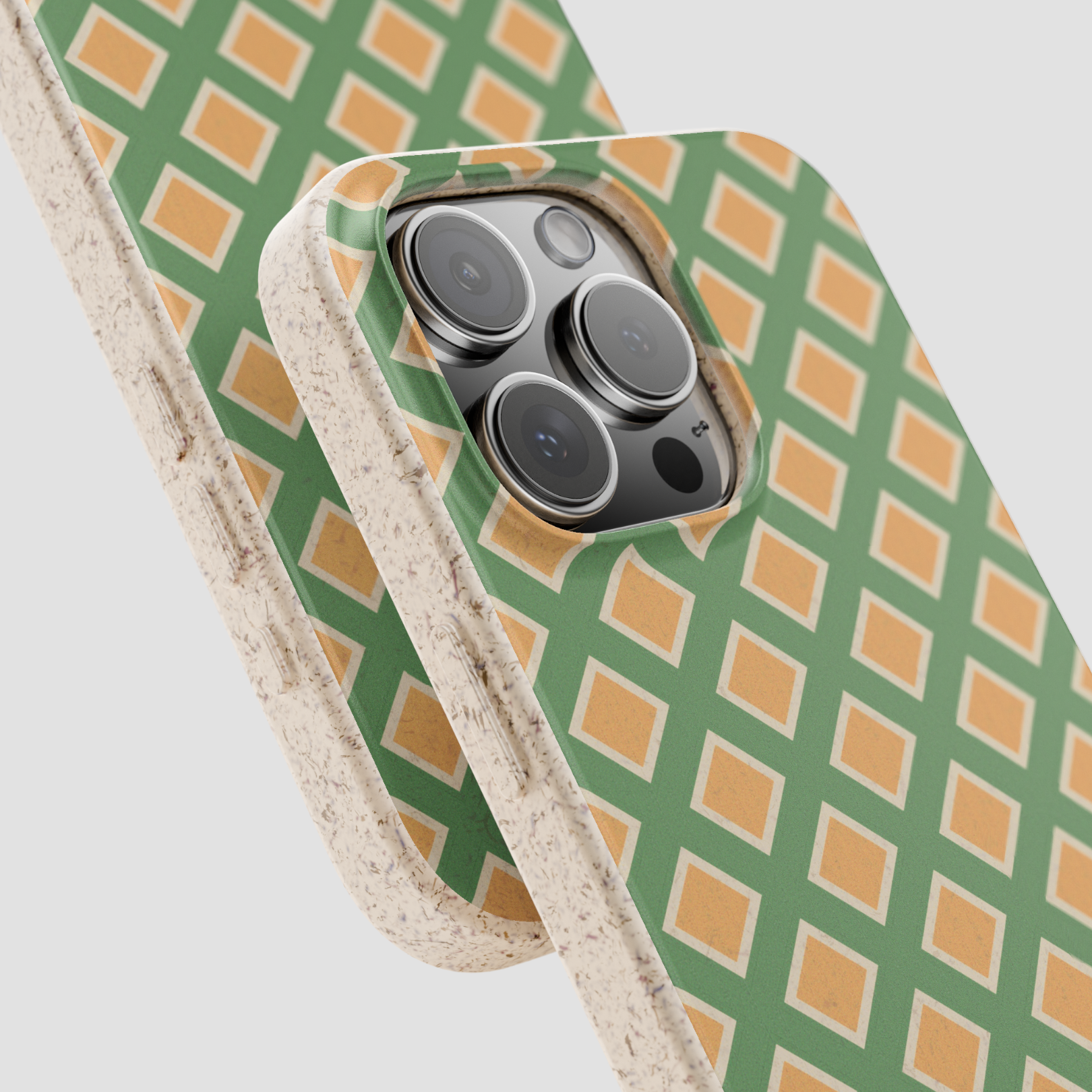 Phone case with green and orange geometric pattern on a white background