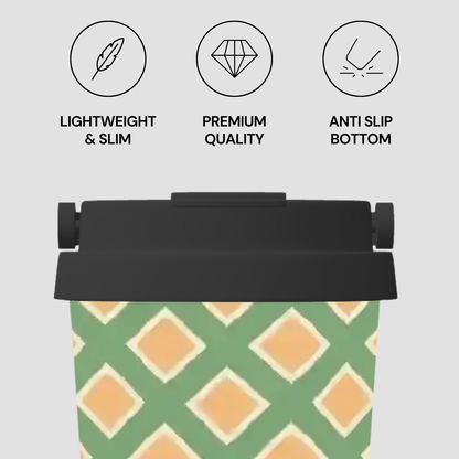 Green and orange geometric patterned container with black lid on a light gray background, featuring icons and text about product features.