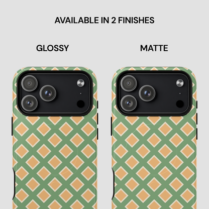 Two phone cases with green and beige geometric pattern, one glossy and one matte, on a light gray background.