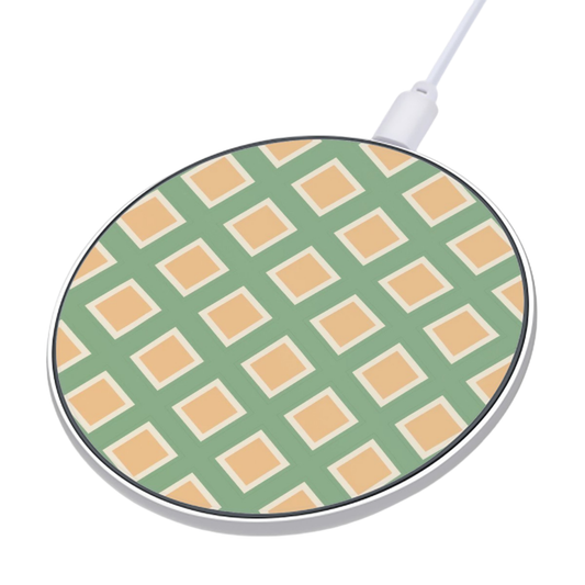 Round wireless charging pad with green and beige checkered pattern on a white background