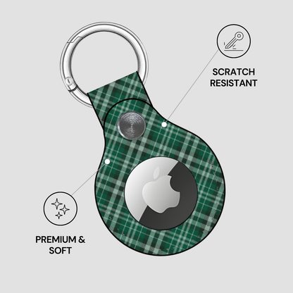 Green plaid keychain with Apple logo on a gray background