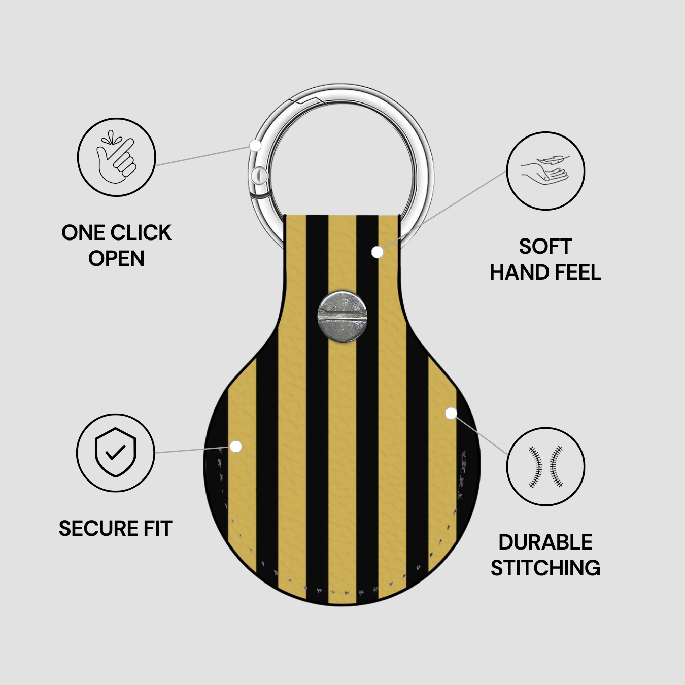Keychain with black and gold striped design on a gray background