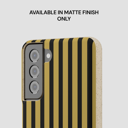 Phone case with black and gold striped design on a light gray background