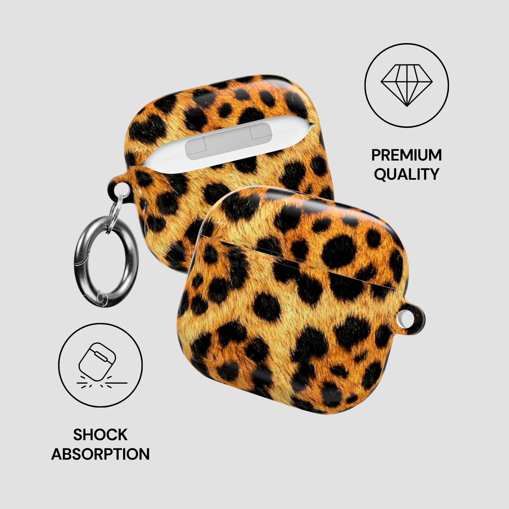 Leopard print AirPod case with keychain on a light gray background