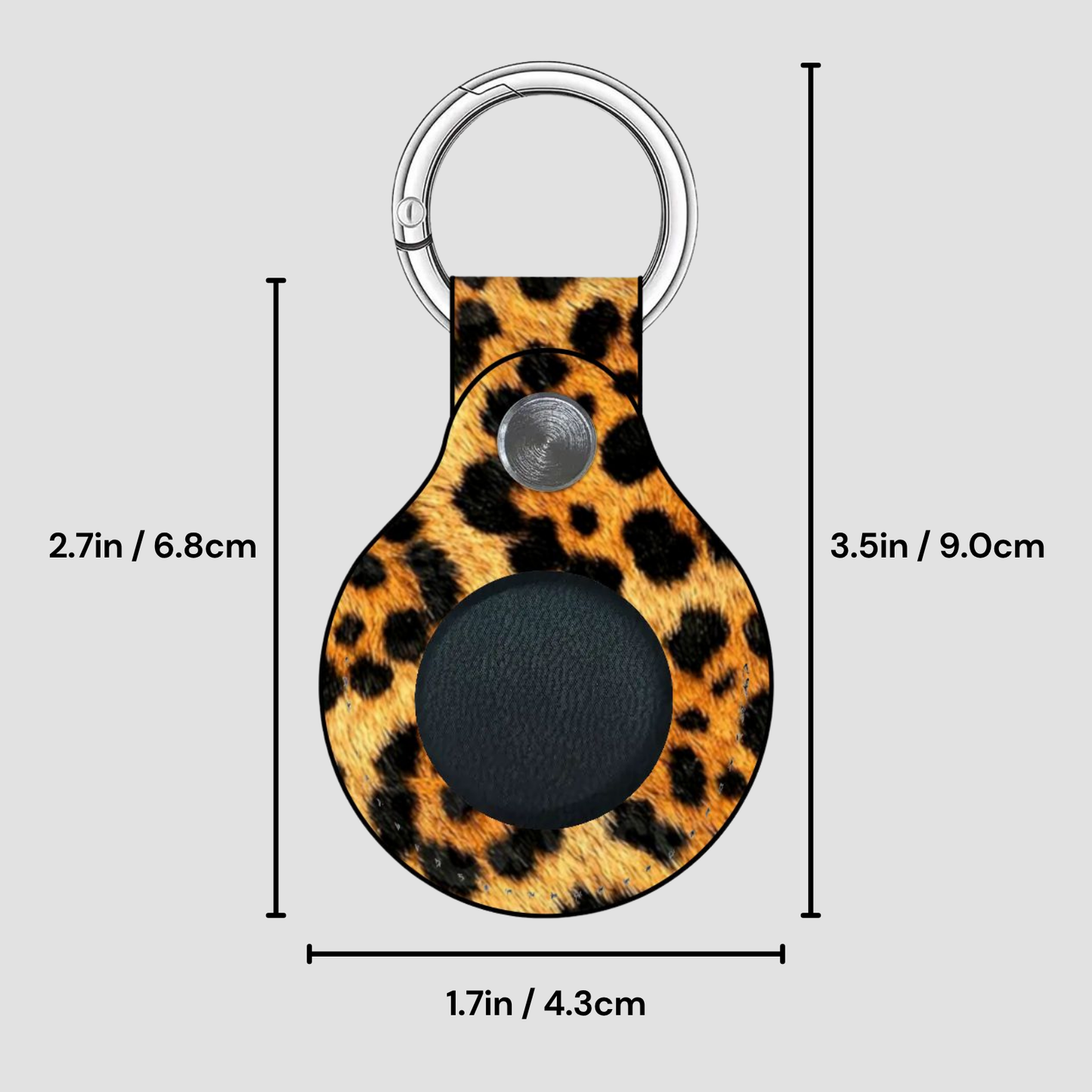 Leopard print keychain with measurements on a gray background