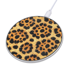 Round wireless charging pad with leopard print design on a white background