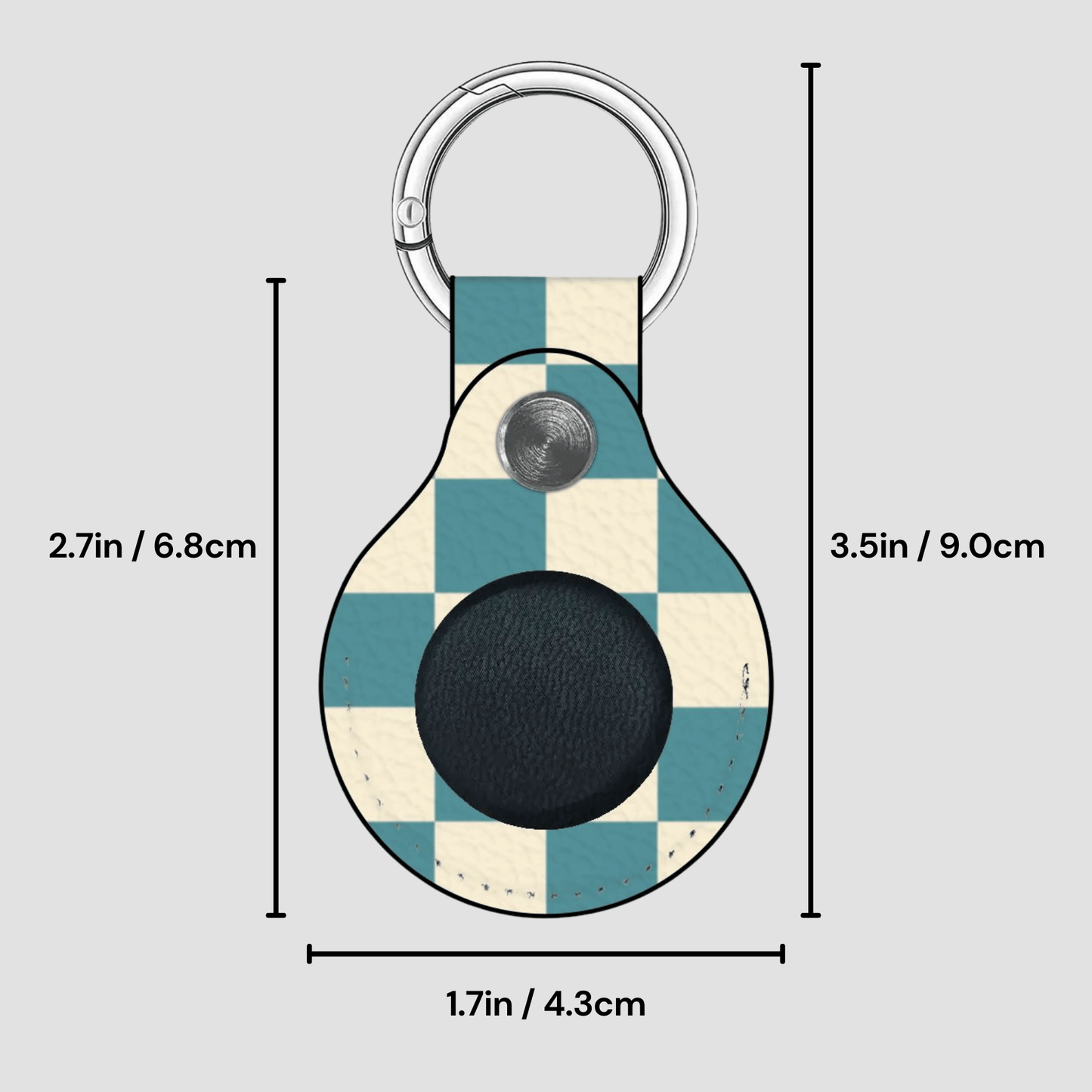 Checkered keychain with measurements on a gray background