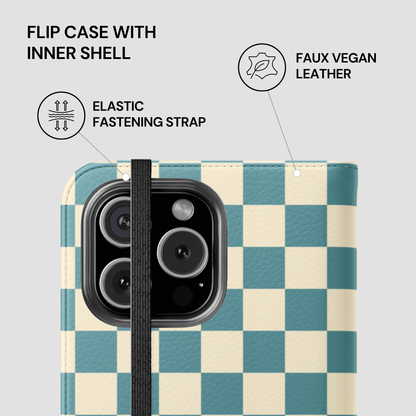 Checkered flip case with inner shell, elastic fastening strap, and faux vegan leather on a white background.