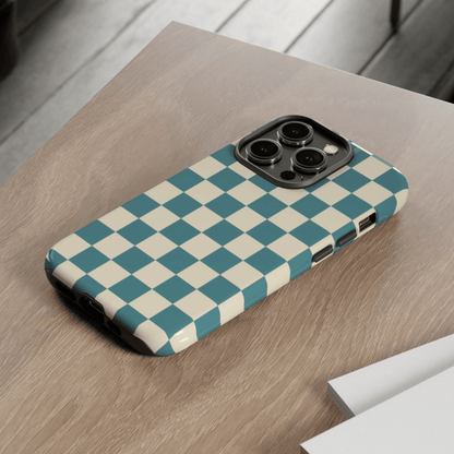 Phone case with blue and beige checkered pattern on a wooden surface