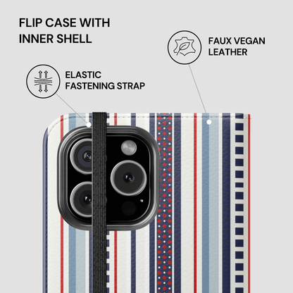 Flip case with inner shell featuring faux vegan leather, elastic fastening strap, and striped design.