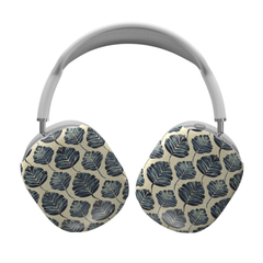Headphones with leaf patterned ear covers on a white background