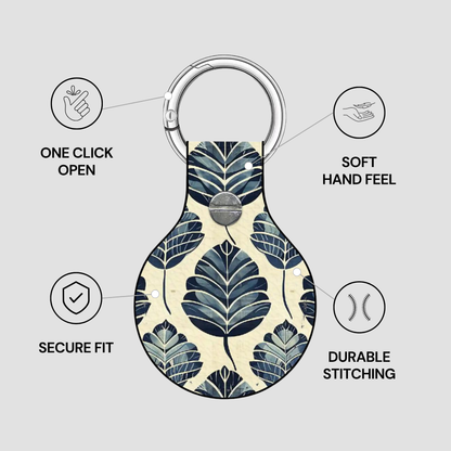 Keychain with leaf pattern and features listed on a gray background
