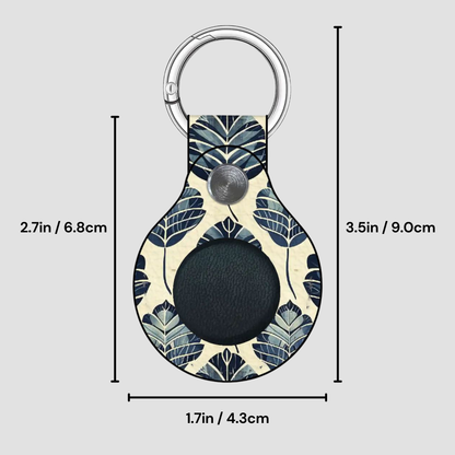 Keychain with leaf pattern and measurements on a gray background