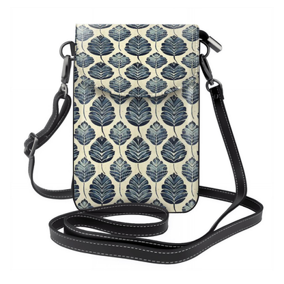 Phone crossbody bag with blue leaf pattern on a white background