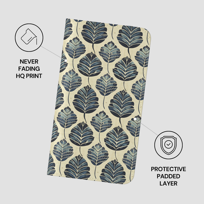 Folded fabric with leaf pattern on a light gray background