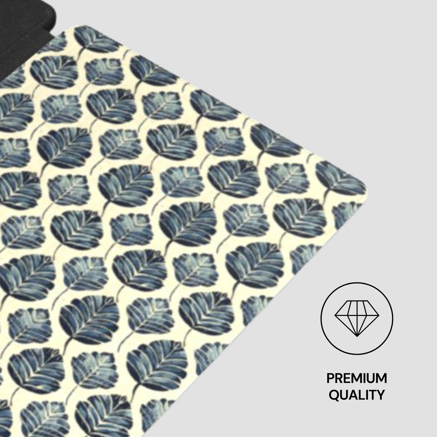 Patterned fabric with leaf design on a gray background, featuring a 'Premium Quality' label.