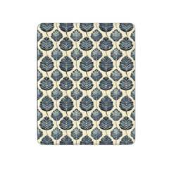 Patterned mouse pad with blue leaf design on a beige background