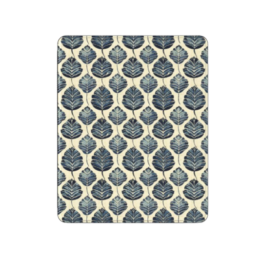 Patterned mouse pad with blue leaf design on a beige background
