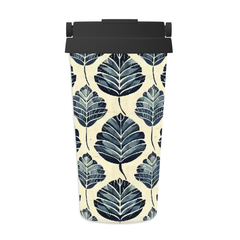 Tumbler with blue leaf pattern on a white background