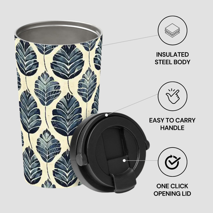 Tumbler with leaf pattern and black lid on a light gray background