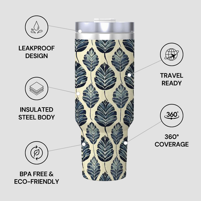 Tumbler with leaf pattern and feature icons on a light gray background