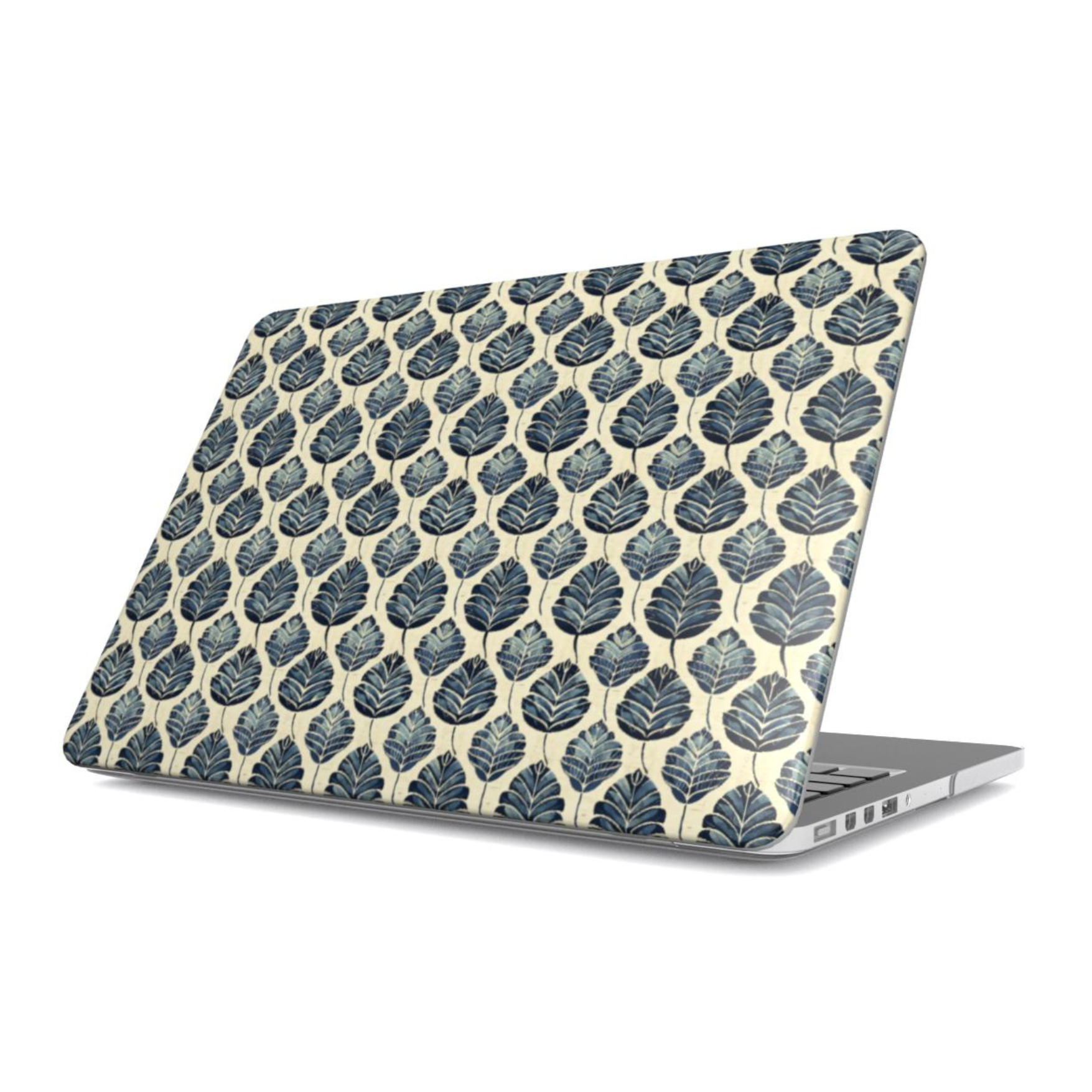 Laptop with black and white polka dot design on a white background