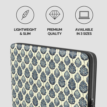 Laptop sleeve with leaf pattern and product features on a light gray background