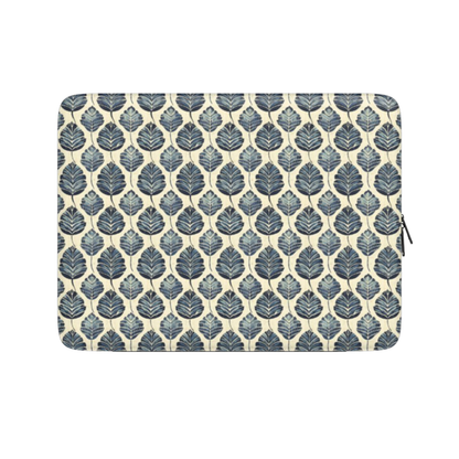 Laptop sleeve with blue leaf pattern on a beige background